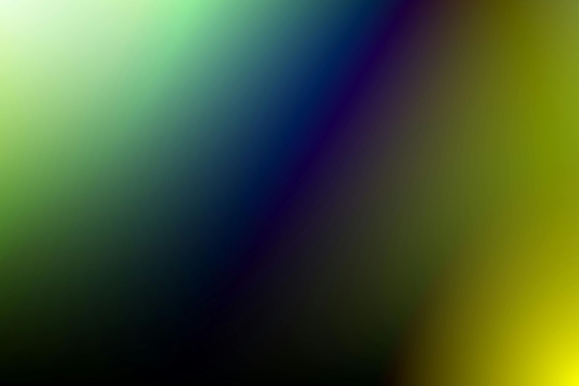Abstract gradient background with green, blue, purple, and yellow light blending into dark black shadows